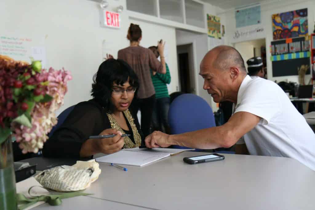 I followed Don Kao, a Chinese American LGBT activist, around for weeks on an assignment from New York Times photo editor James Estrin. I captured this moment of Don helping a woman fill out paperwork. It exemplifies how hands on and willing to help Don is, especially among LGBTQ youth.