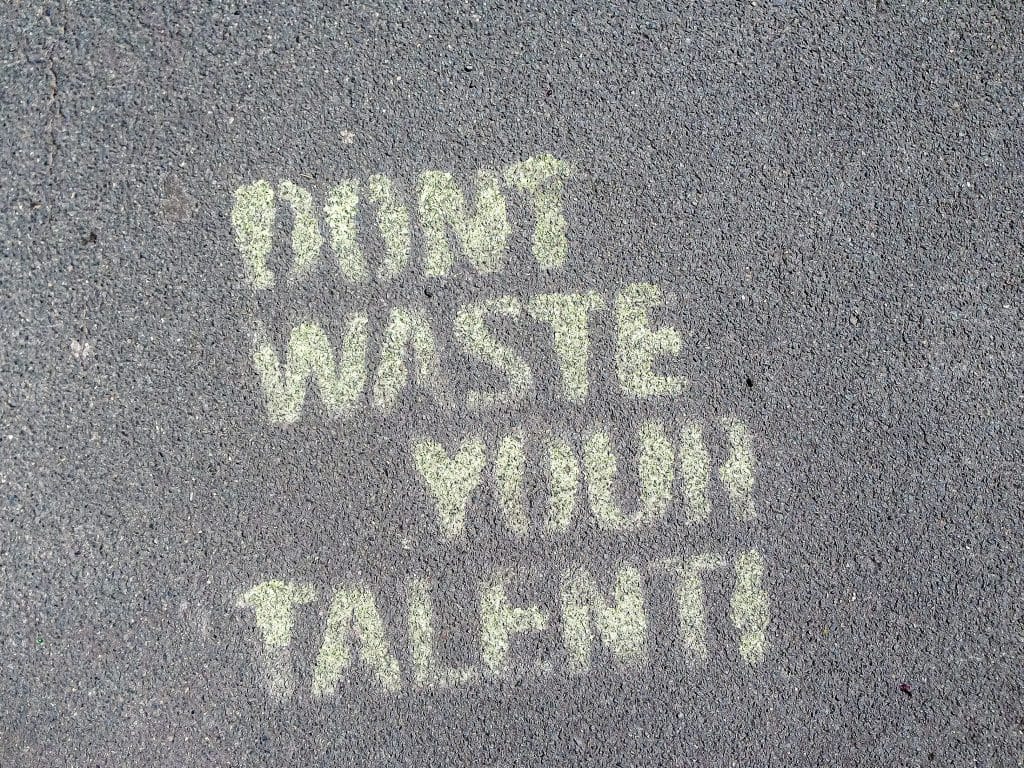 So true: Don't waste your talent! Sprayed on the streets of Berlin.