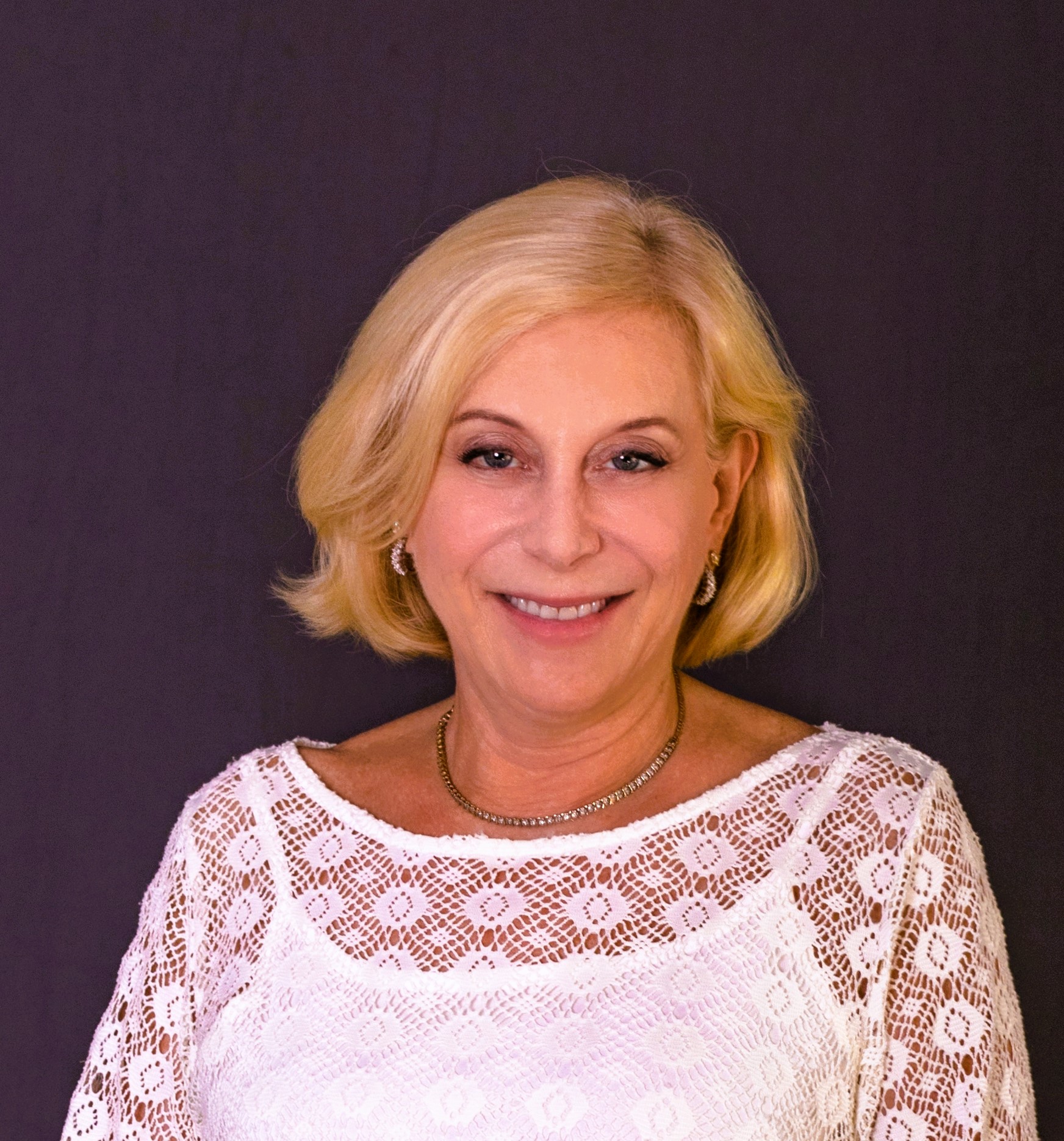 Melanie Young Headshot Cropped Credit Bobby Ryan Portraits 1 - Coach Foundation